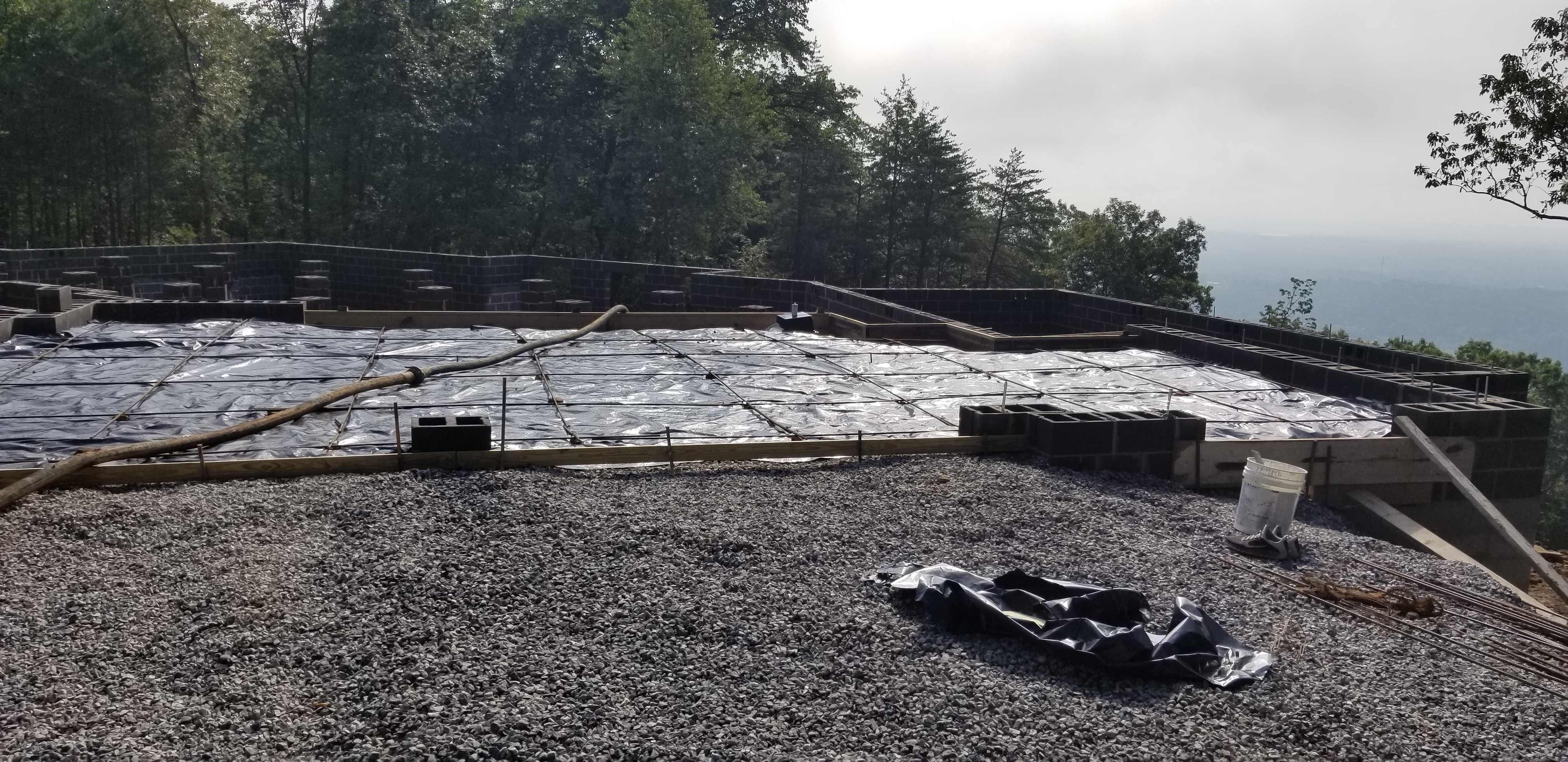 Foundation prep with vapor barrier and wire mesh