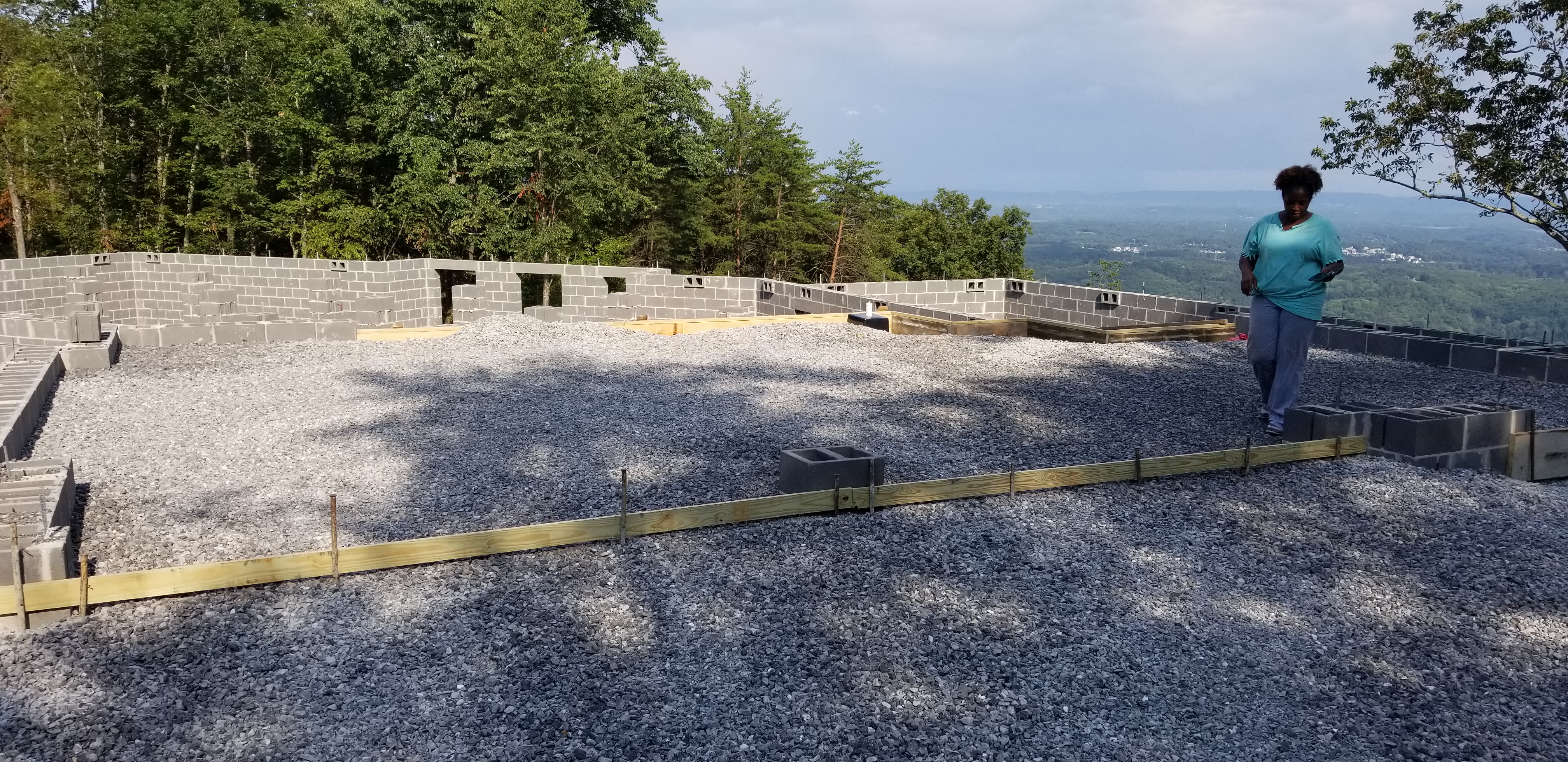 Gravel base preparation for concrete foundation