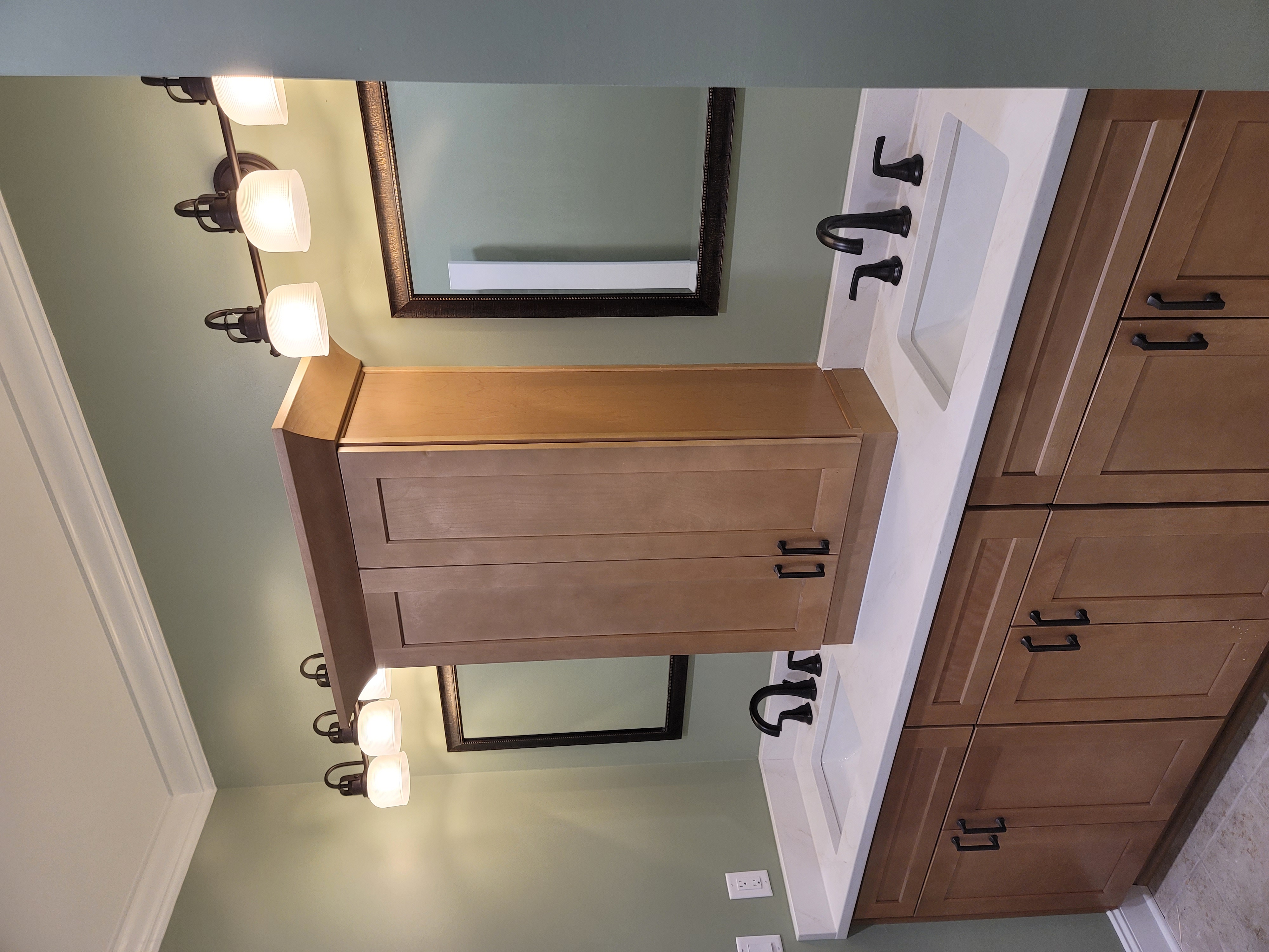 Bathroom double vanity with center tower