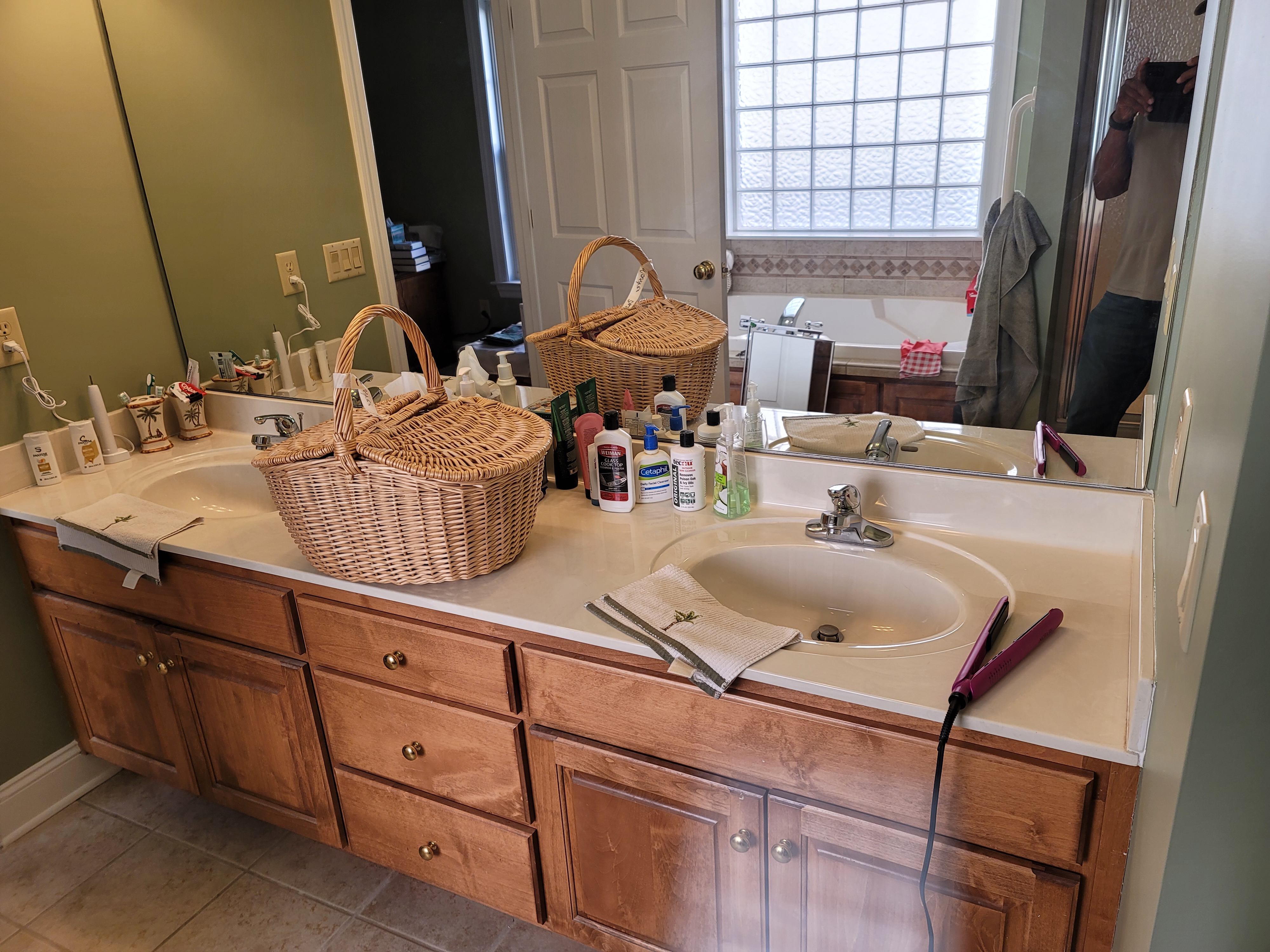 Bathroom double vanity with wood cabinets