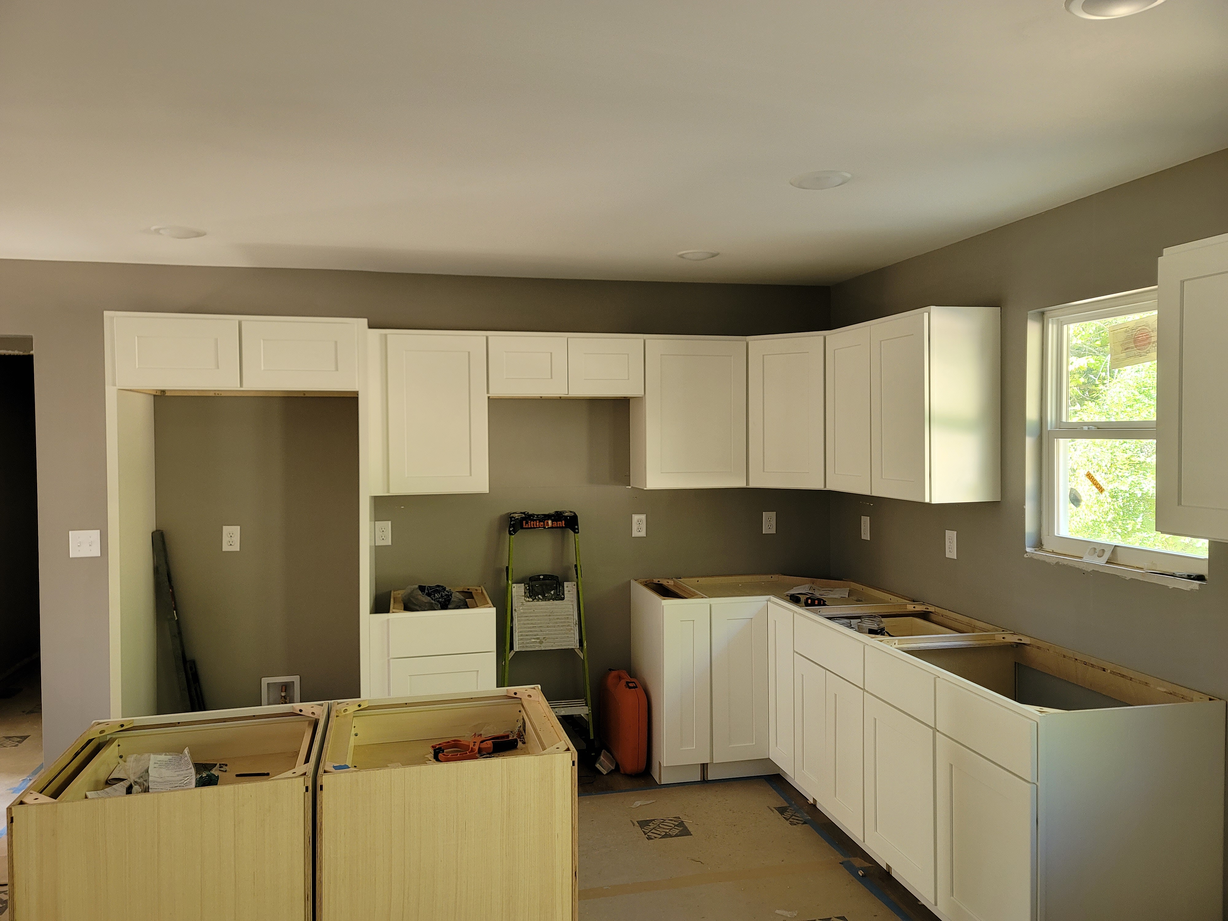 White kitchen cabinet installation